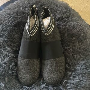 Used comfortable black DKNY sneakers